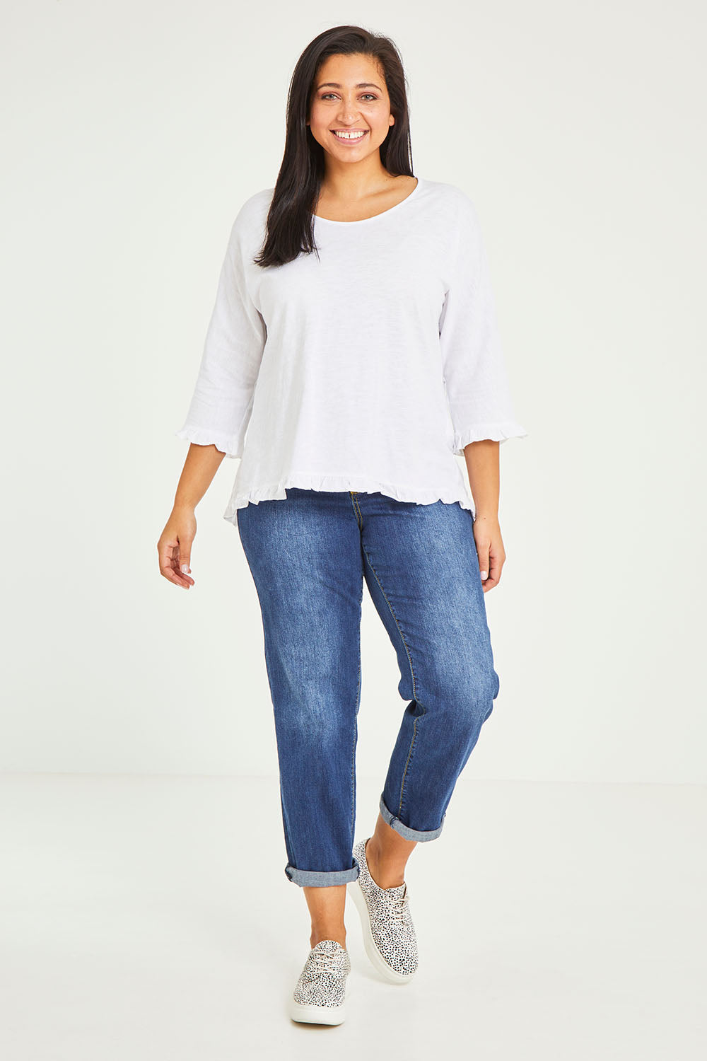 Model Terri-Leigh wearing size 14 of the Ruffle 3/4 Sleeve Top in colour White (White), from the front, showing the whole outfit
