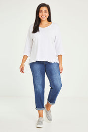Model Terri-Leigh wearing size 14 of the Ruffle 3/4 Sleeve Top in colour White (White), from the front, showing the whole outfit