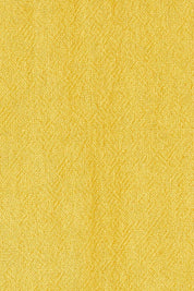 Product shot of the Upcycle Cowly Top in colour Sunflower, detail