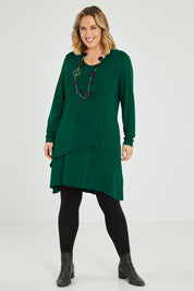 Model Jess wearing size 14 of the Overlay Tunic in colour Forest (Green), from the front, showing the whole outfit