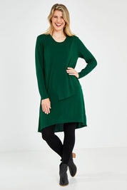 Model Kelly wearing size 10 of the Overlay Tunic in colour Forest (Green), from the front, showing the whole outfit