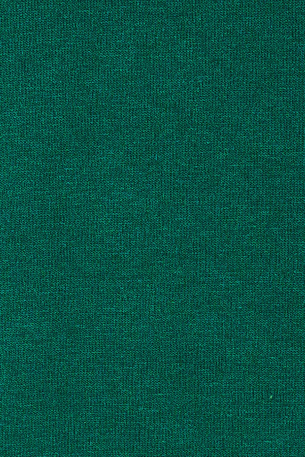 Product shot of the Overlay Tunic in colour Forest (Green), detail