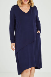 Model Jess wearing size 14 of the Overlay Dress in colour Navy (Blue), from the front, cropped image