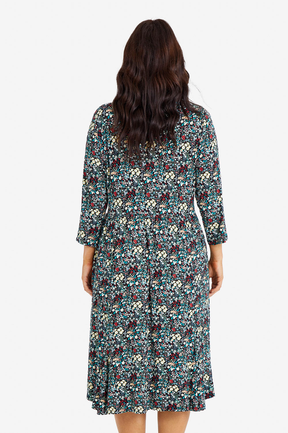 Model Laura wearing size 14 of the Jessie 3/4 Sleeve Dress in colour Ditsy (Blue), from the back