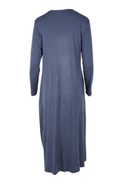 Product shot of the Jo Jo Core Dress in colour Petrol (Blue), from the back
