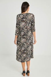 Model Madeline wearing size 10 of the Jo Jo Print Jersey Dress in colour Green (Green), from the back