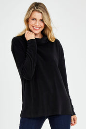 Model Kelly wearing size 10 of the Micro Fleece Cowl in colour Black (Black), from the front, cropped image