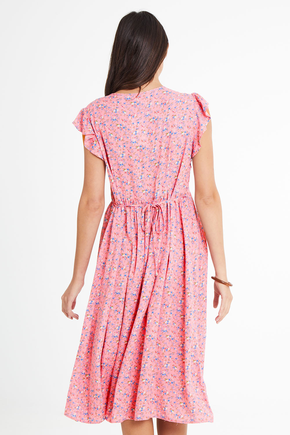 Model Madeline wearing size 10 of the Penny Dress in colour Pink (Pink), from the back