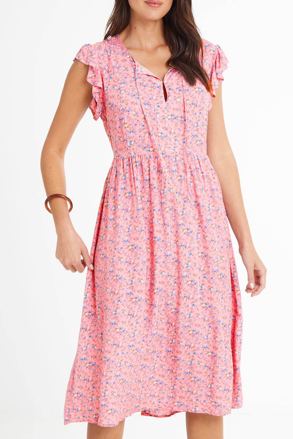 Model Madeline wearing size 10 of the Penny Dress in colour Pink (Pink), from the front, cropped image