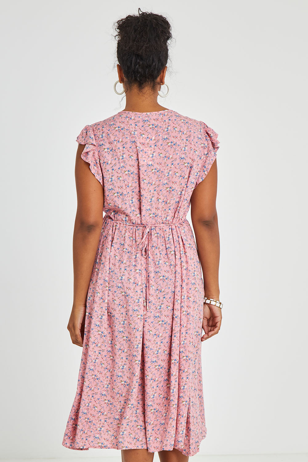 Model Noli wearing size 14 of the Penny Dress in colour Pink (Pink), from the back