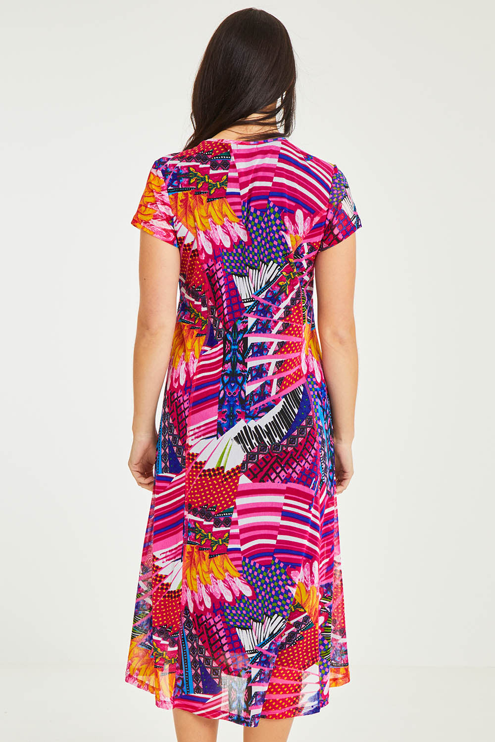 Model Stacey wearing size 10 of the Panel Mesh Dress in colour Hotpink (Pink), from the back
