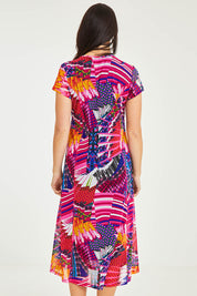 Model Stacey wearing size 10 of the Panel Mesh Dress in colour Hotpink (Pink), from the back