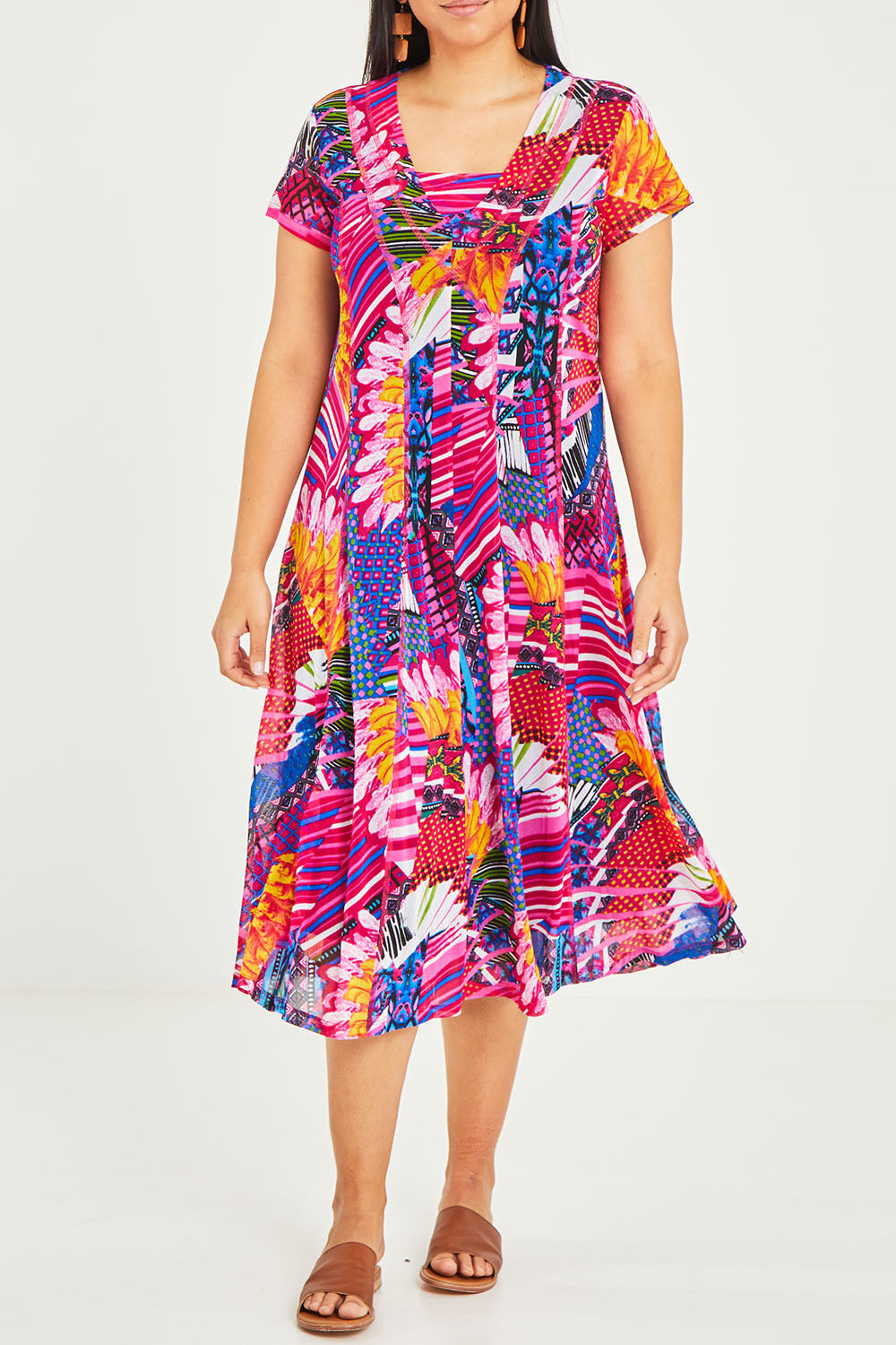 Model Terri-Leigh wearing size 14 of the Panel Mesh Dress in colour Hotpink (Pink), from the front, cropped image