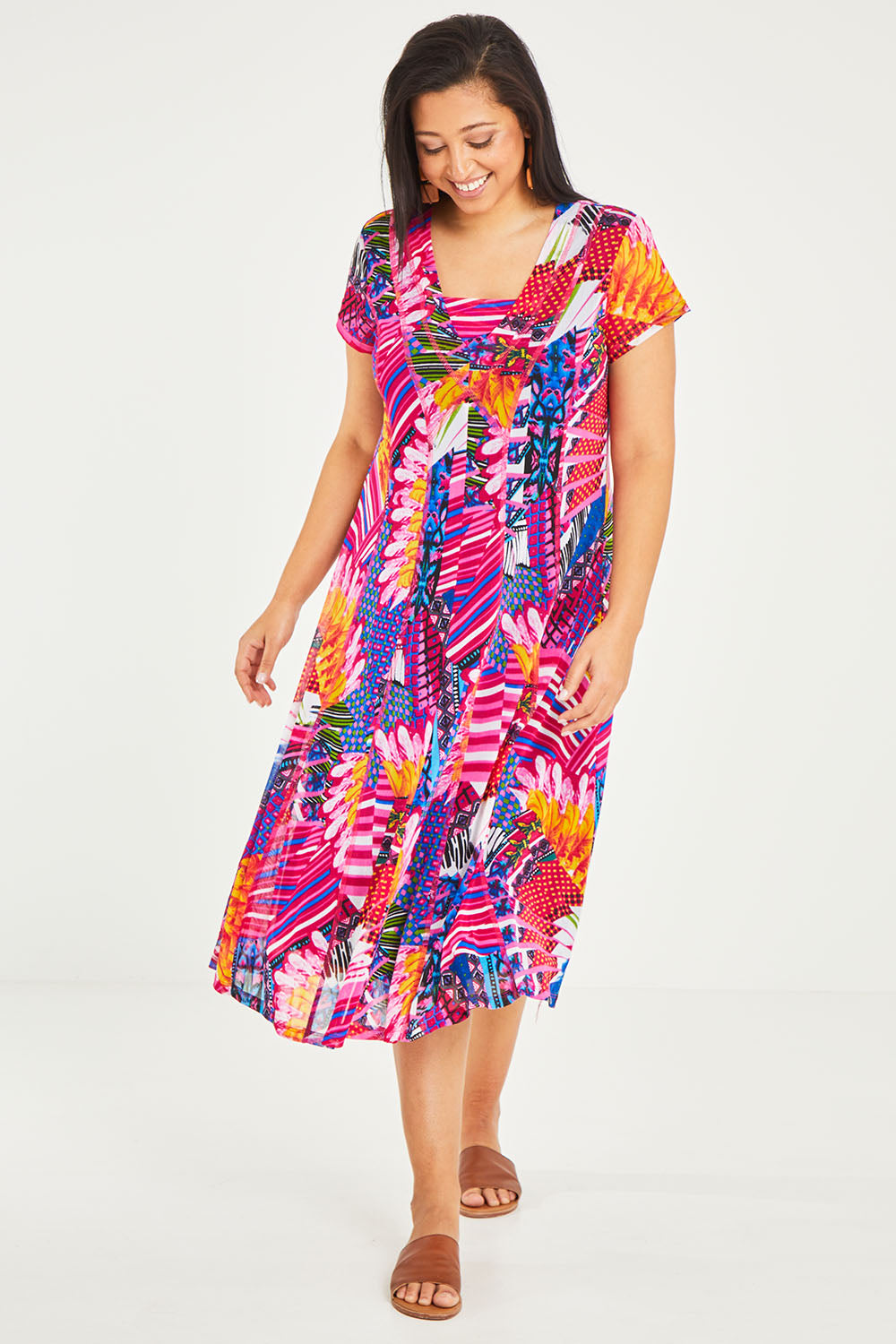 Model Terri-Leigh wearing size 14 of the Panel Mesh Dress in colour Hotpink (Pink), from the front, showing the whole outfit
