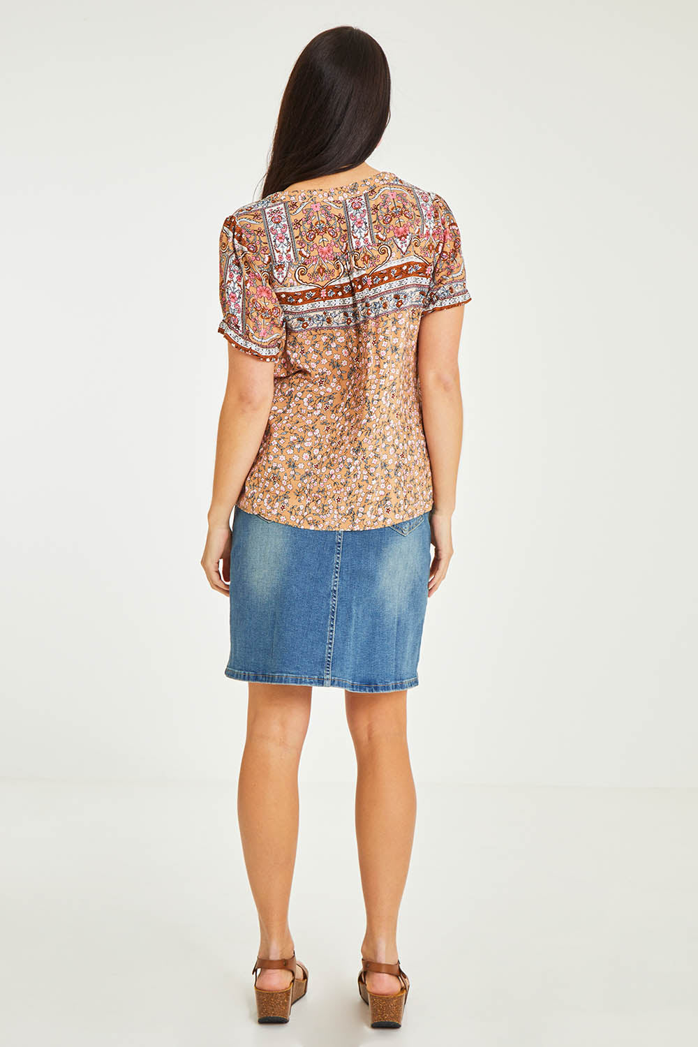 Model Stacey wearing size 10 of the Summer Top in colour Toffee, from the back