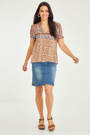Model Stacey wearing size 10 of the Summer Top in colour Toffee, from the front, showing the whole outfit