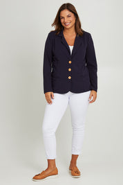 Model Monique wearing size 14 of the Polo Pleasure Jacket in colour Navy (Blue), from the front, showing the whole outfit