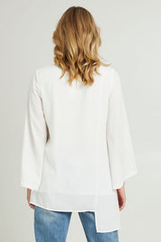 Model Grace wearing size 10 of the Overlay Top in colour White (White), from the back