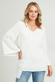 Model Grace wearing size 10 of the Overlay Top in colour White (White), from the front, cropped image