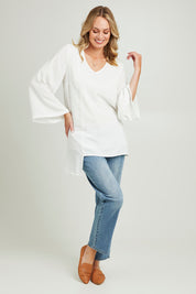 Model Grace wearing size 10 of the Overlay Top in colour White (White), from the front, showing the whole outfit