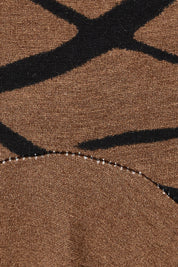 Product shot of the Bounce Dress in colour Mocha, detail