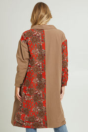 Model Grace wearing size 10 of the Print Splice Coat in colour Rust (Red), from the back