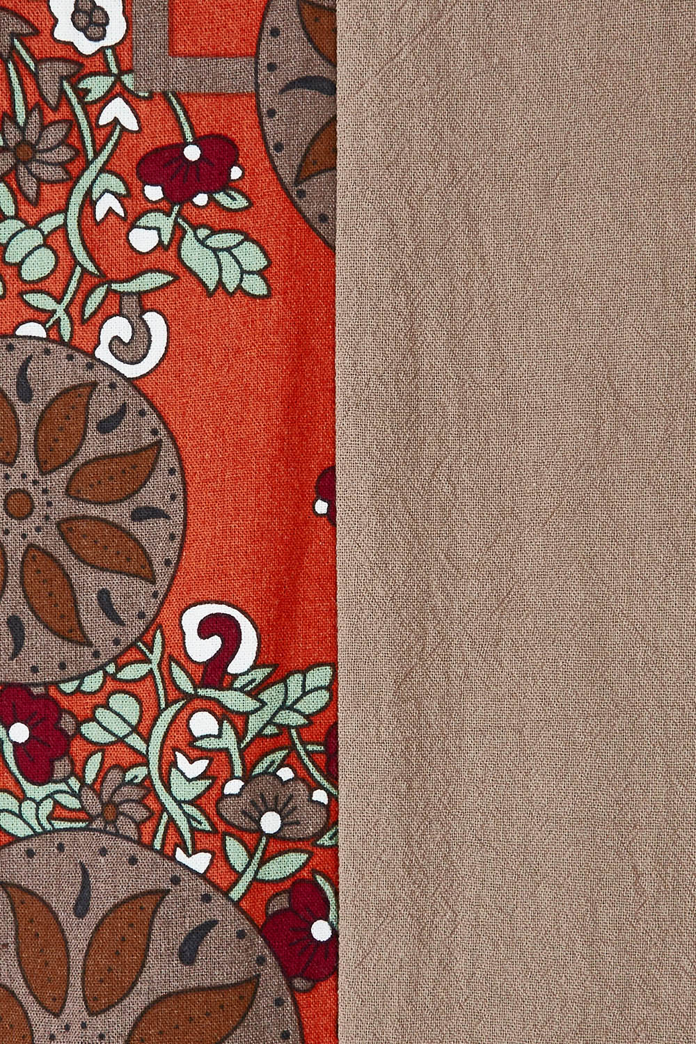 Product shot of the Print Splice Coat in colour Rust (Red), detail