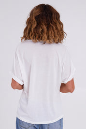 Model Emma wearing size 10 of the Floral Bouquet Tee in colour White (White), from the back