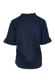 Product shot of the Ruffle Tee Top in colour Navy (Blue), from the back