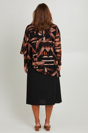 Model Monique wearing size 14 of the Overlay Cap Dress in colour Coffee (Blue), from the back