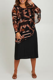 Model Monique wearing size 14 of the Overlay Cap Dress in colour Coffee (Blue), from the front, cropped image