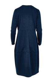 Product shot of the Core Pocket Dress in colour Navy (Blue), from the back