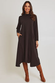 Model Madeline wearing size 10 of the Margie Cowl Pocket Cotton Blend Dress in colour Mocha, from the front, showing the whole outfit