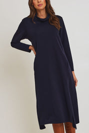 Model Madeline wearing size 10 of the Margie Cowl Pocket Cotton Blend Dress in colour Navy (Blue), from the front, cropped image