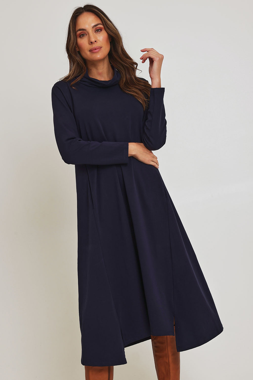 Model Madeline wearing size 10 of the Margie Cowl Pocket Cotton Blend Dress in colour Navy (Blue), from the front, cropped image
