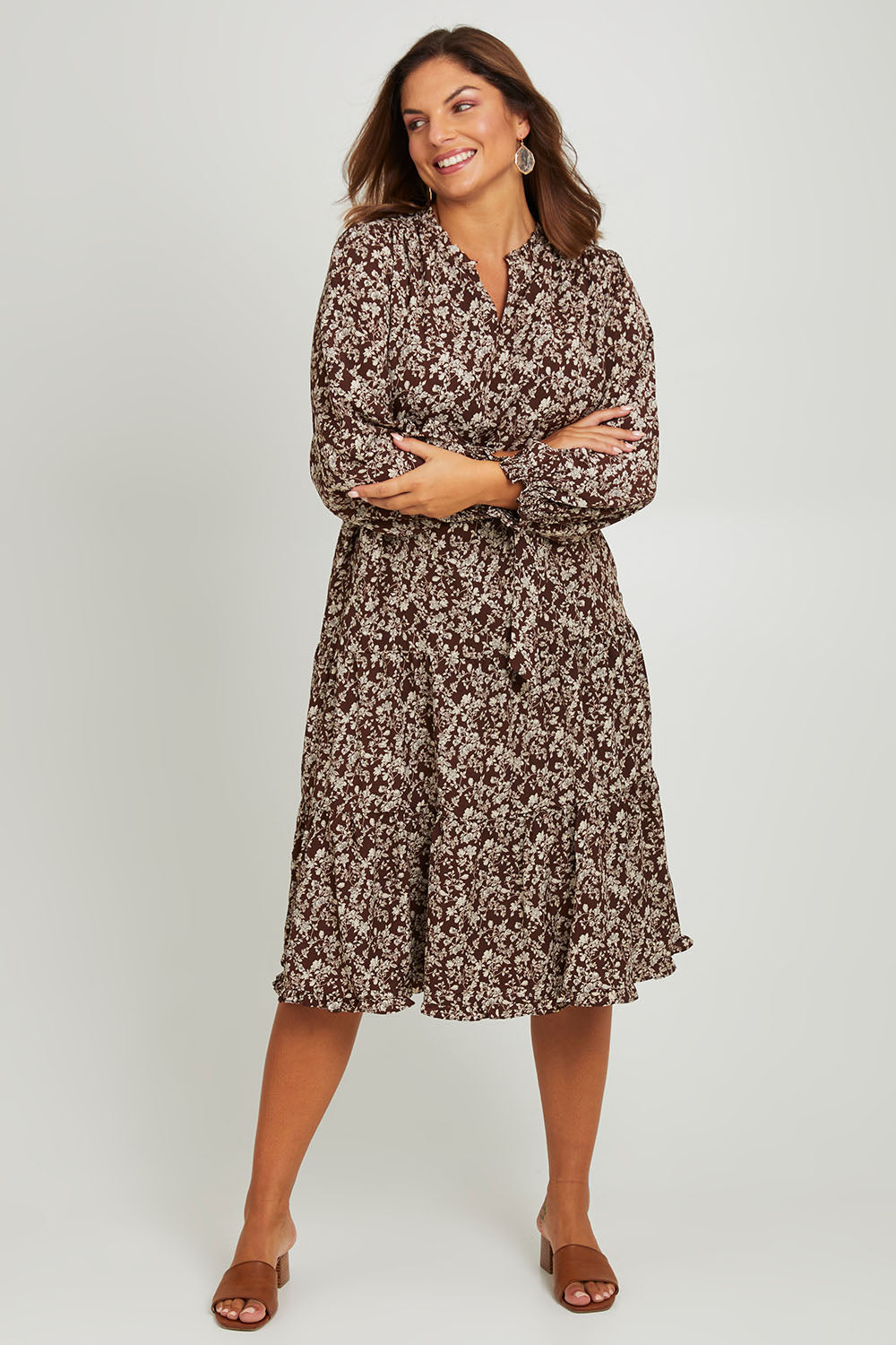 Model Monique wearing size 14 of the Felicia Dress in colour Mocha, from the front, showing the whole outfit