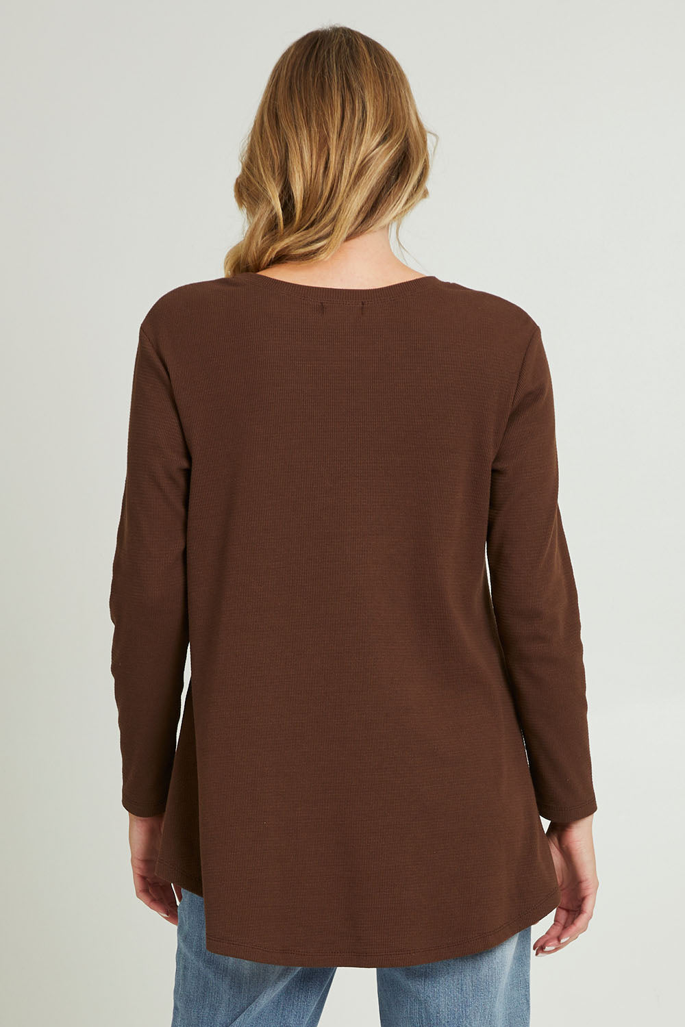 Model Grace wearing size 10 of the Swing Waffle Top in colour Espresso, from the back