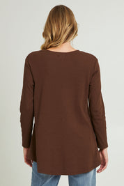 Model Grace wearing size 10 of the Swing Waffle Top in colour Espresso, from the back
