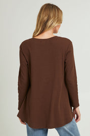 Model Grace wearing size 10 of the Swing Waffle Top in colour Espresso, from the back
