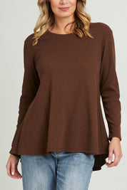 Model Grace wearing size 10 of the Swing Waffle Top in colour Espresso, from the front, cropped image