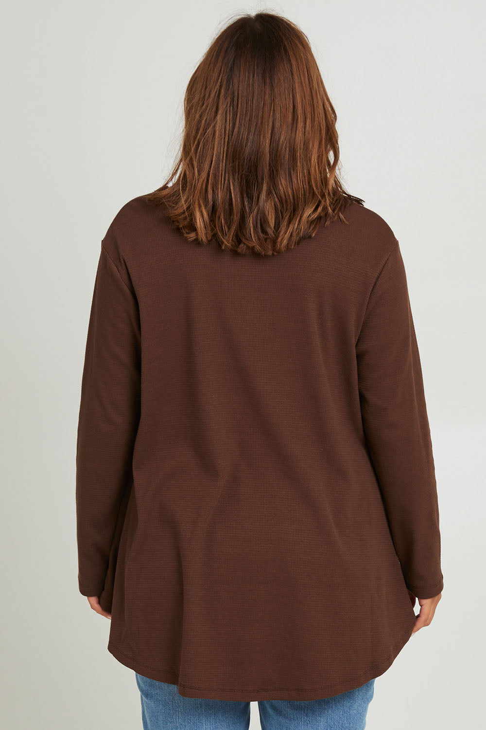 Model Monique wearing size 14 of the Swing Waffle Top in colour Espresso, from the back