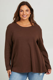 Model Monique wearing size 14 of the Swing Waffle Top in colour Espresso, from the front, cropped image