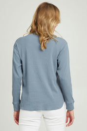 Model Grace wearing size 10 of the Waffle Weekend Crew in colour Ink (Blue), from the back