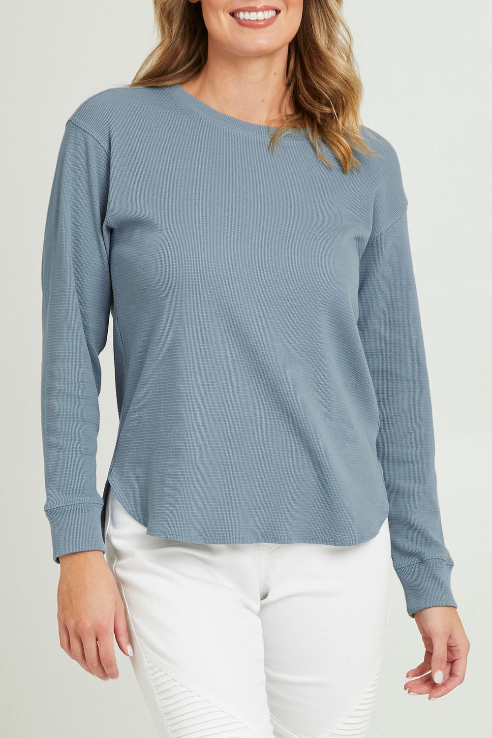 Model Grace wearing size 10 of the Waffle Weekend Crew in colour Ink (Blue), from the front, cropped image