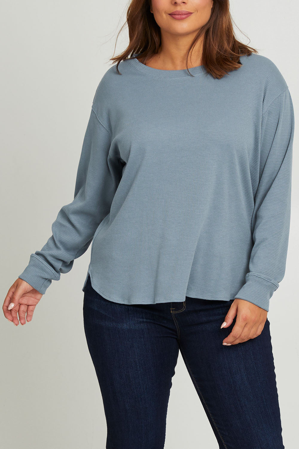 Model Monique wearing size 14 of the Waffle Weekend Crew in colour Ink (Blue), from the front, cropped image