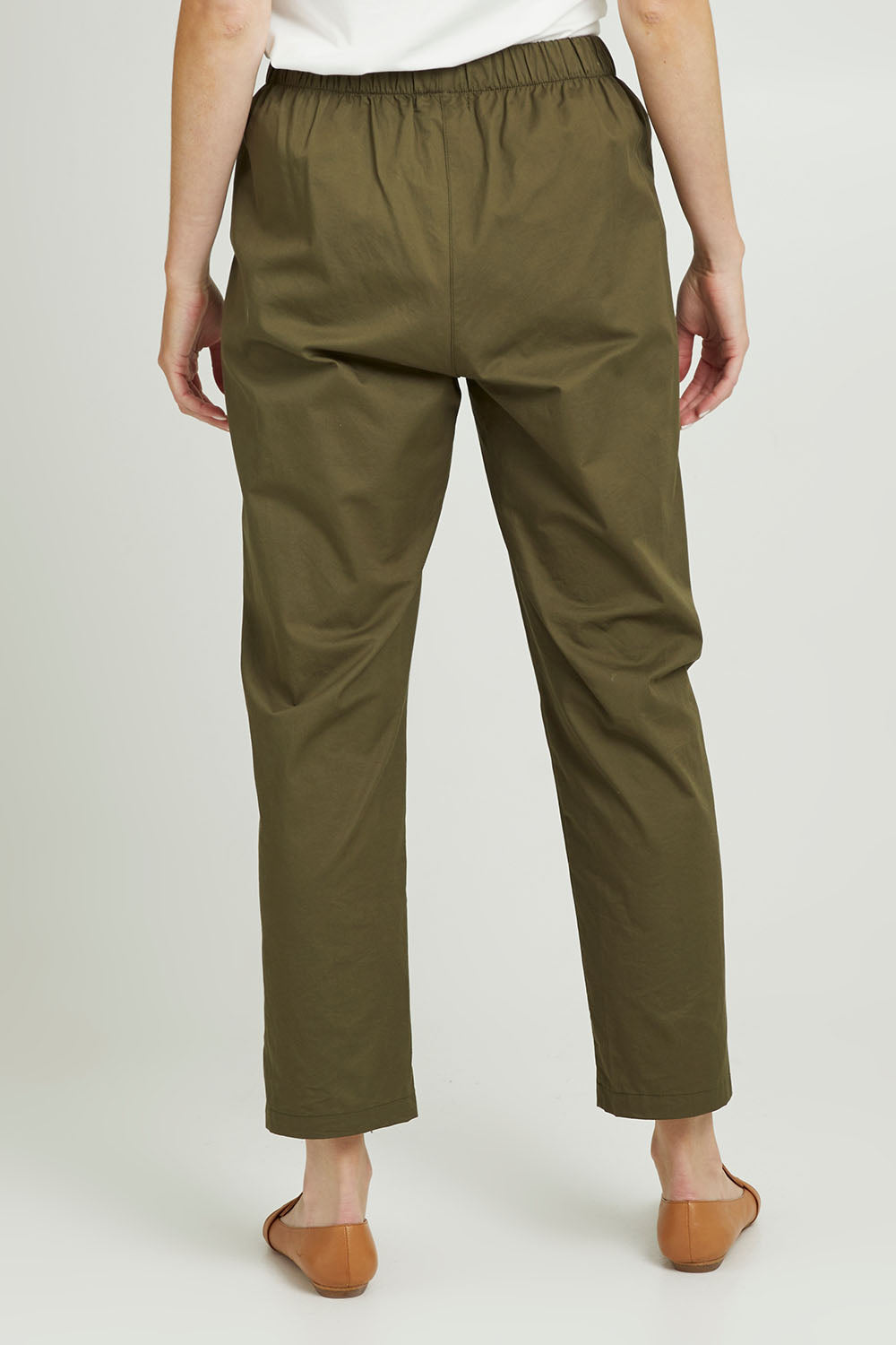 Model Grace wearing size 10 of the Cotton Cargo Pant in colour Khaki (Green), from the back