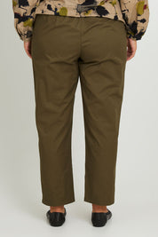 Model Monique wearing size 14 of the Cotton Cargo Pant in colour Khaki (Green), from the back