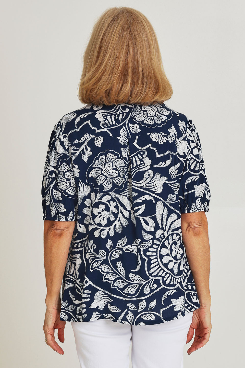 Model Sandy wearing size 10 of the Poet Shirt in colour Navywhite (Blue), from the back