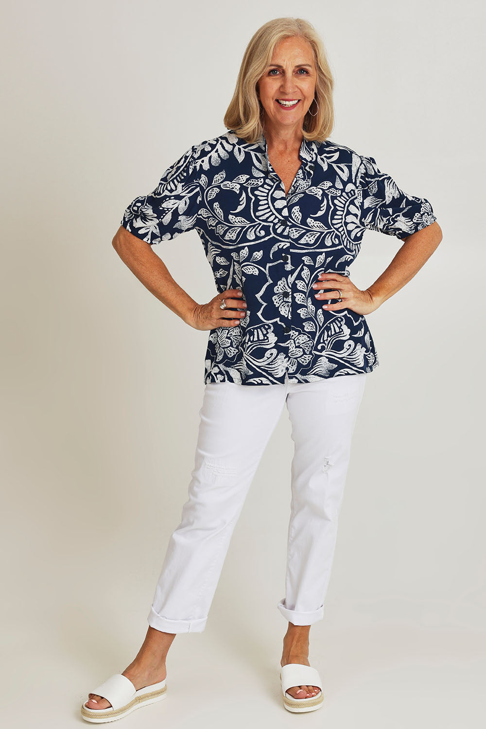 Model Sandy wearing size 10 of the Poet Shirt in colour Navywhite (Blue), from the front, showing the whole outfit
