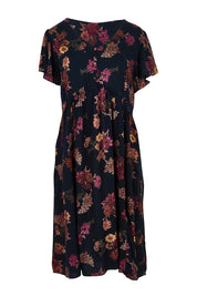 Product shot of The Flounce Dress in colour Navypink (Blue), from the front